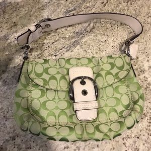 Coach Purse with decorative buckle